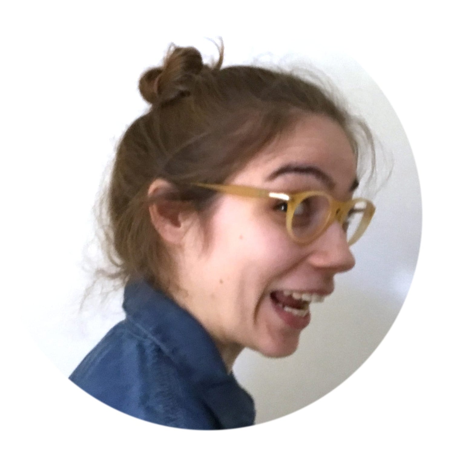 Elizabet Vukovic in profile view with glasses smiling