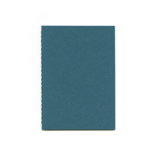 Blue notebook with stitched spine.