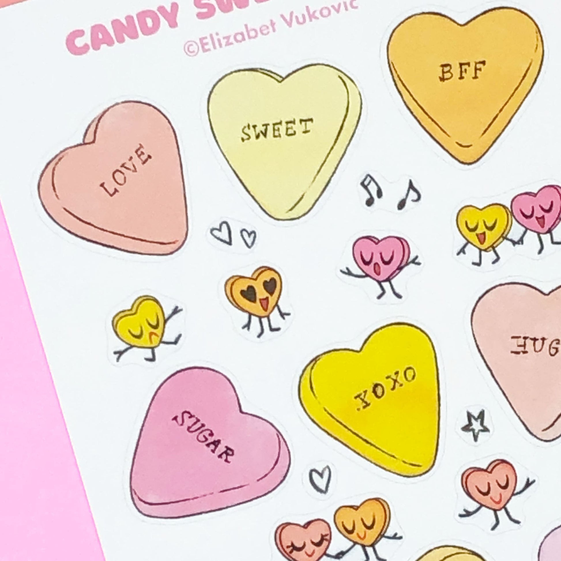Whimsical candy conversation hearts stickers.