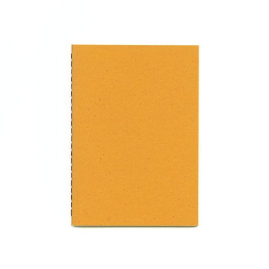 A yellow textured notebook with brown thread stitched spine on a white background.