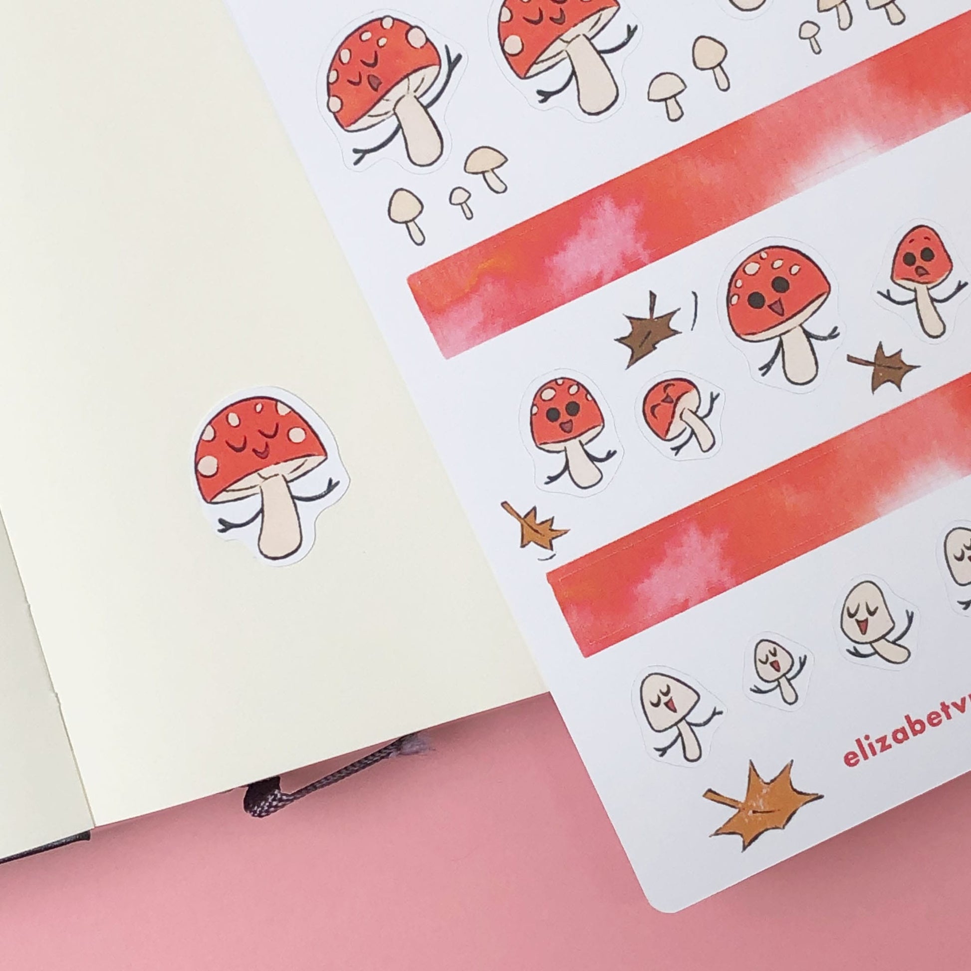 Mushroom art stickers on a journal page.