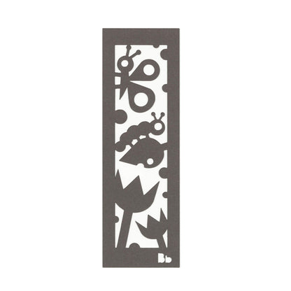 A dark brown paper bookmark with cut-outs of a caterpillar, butterfly, tulips and leaves on a white background.
