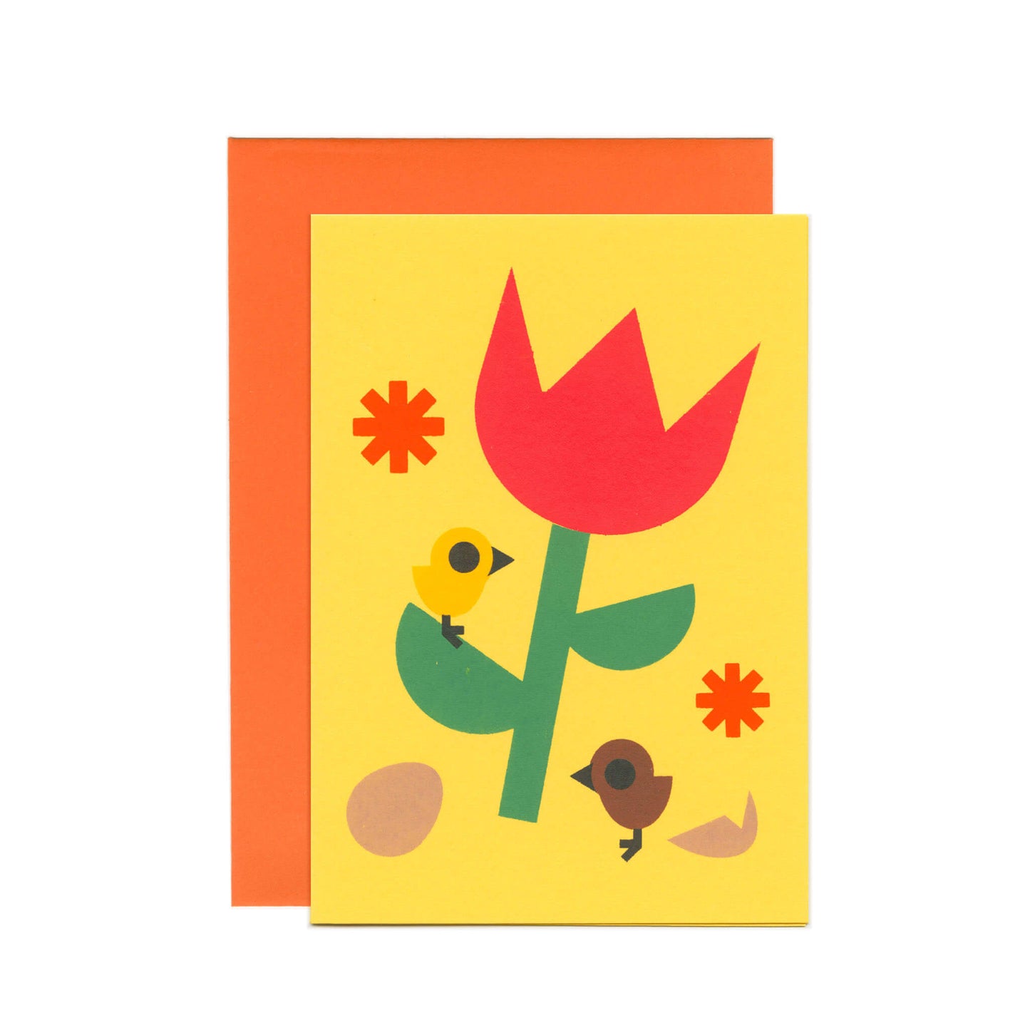 A yellow card with an illustration of a tulip, flowers, chicks and egg. Behind the card there's an orange envelope.