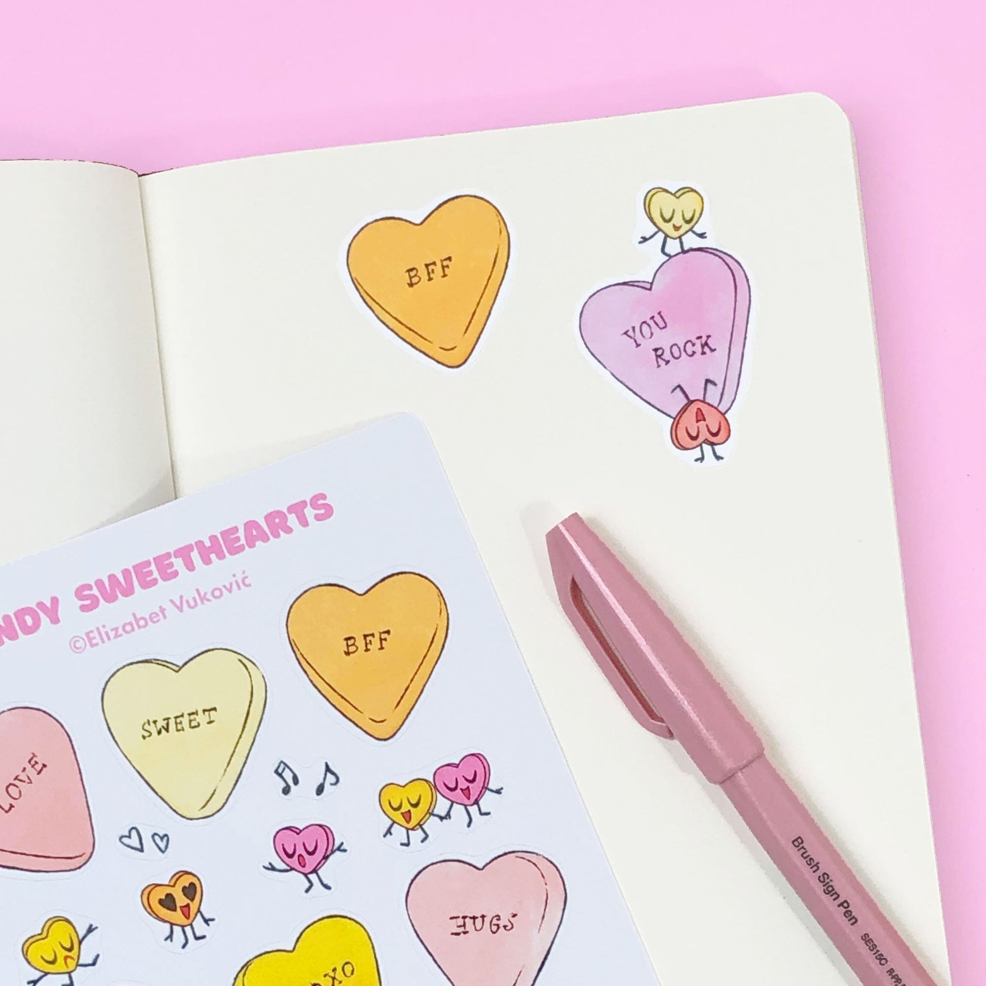Cute candy heart conversation stickers on a journal page.